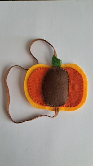 Marque-page d'automne élastique pratique et citrouille en feutrine pour garder vos pages avec style et douceur.