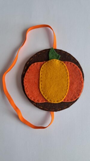 Marque-page d'automne élastique pratique et citrouille en feutrine pour garder vos pages avec style et douceur.